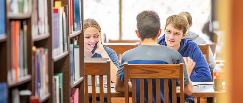 students in library