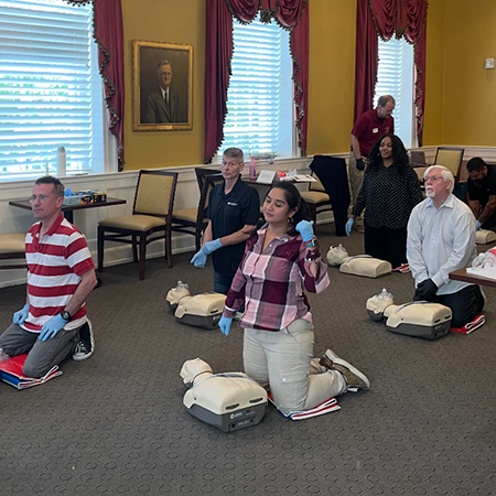 HRSM employees learning CPR