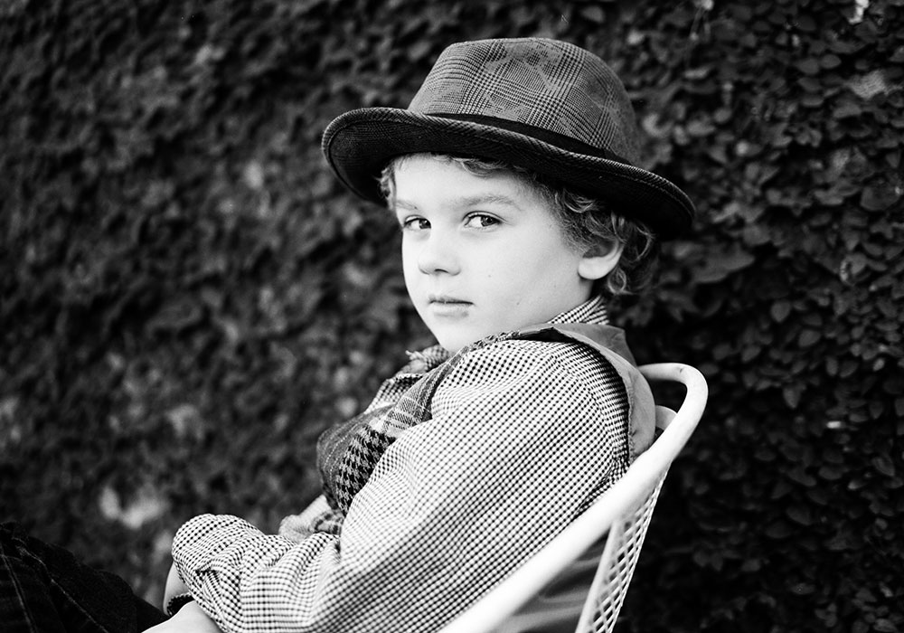 A black & white photo of Jake Panus as a 6 year old child.